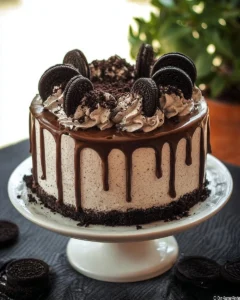 Delicious homemade Oreo Cake with layers and Oreo cookie toppings.