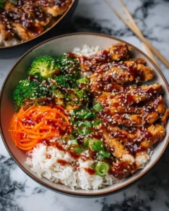 Delicious Sticky Chicken Bowl with vegetables and rice