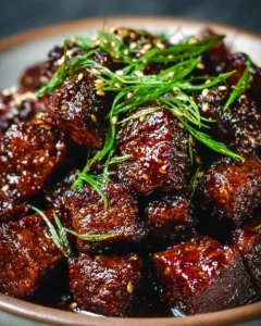 Sweet and sticky steak bites served on a platter