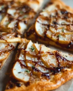 Delicious Balsamic Pear Pizza topped with sweet pears and balsamic glaze