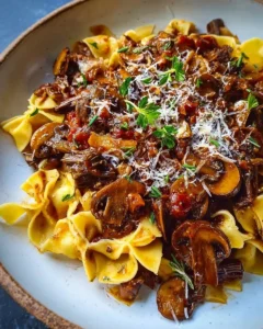 Delicious Mushroom Ragu served over pasta, showcasing earthy flavors and rich textures.