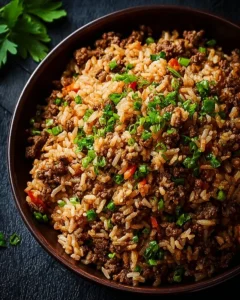 Delicious plate of quick and tasty dirty rice with ground beef