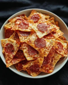 Homemade 2 ingredient pizza chips served on a plate.