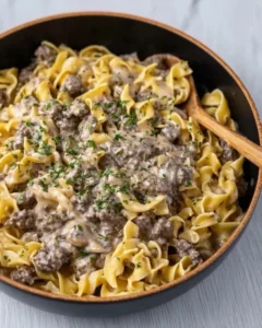 Plate of 30-Minute Ground Beef Stroganoff with creamy sauce over noodles