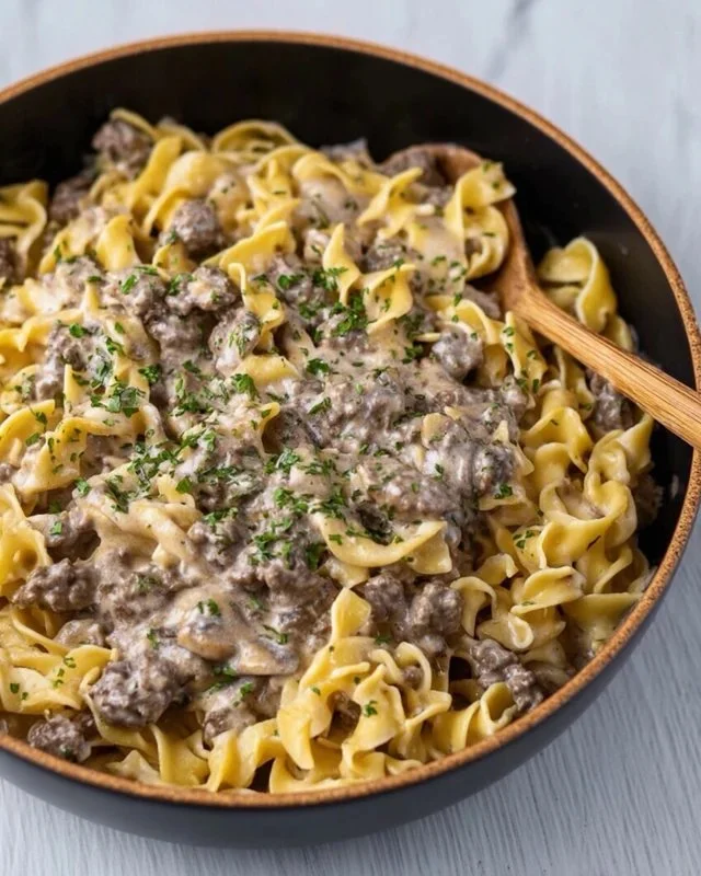 Plate of 30-Minute Ground Beef Stroganoff with creamy sauce over noodles