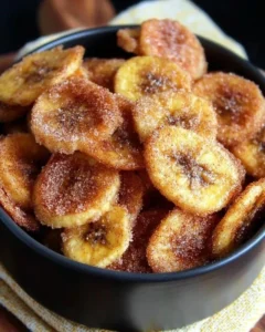 Crispy cinnamon-sugar air fryer banana chips in a bowl