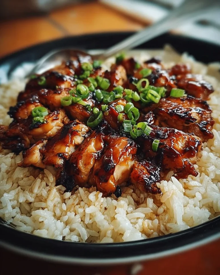 Honey BBQ Chicken served over rice with garnish