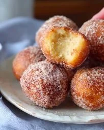 Delicious homemade 2-ingredient banana donut holes on a plate