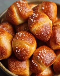 Freshly cooked air fryer pretzel bites served with mustard dip