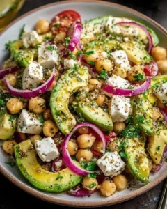 Chickpea Feta Avocado Salad in a bowl, loaded with fresh ingredients