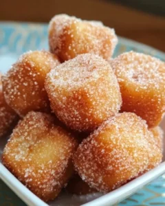Crispy air fryer churro bites with cinnamon sugar coating