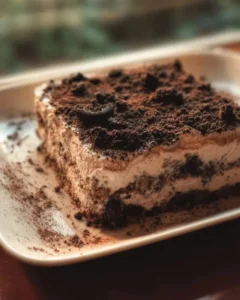 Delicious dirt cake dessert served in a flower pot with gummy worms