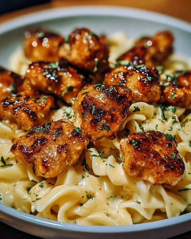 Garlic Butter Chicken Bites served with Savory Creamy Parmesan Pasta
