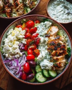 Delicious Greek Chicken Bowl with fresh vegetables and rice