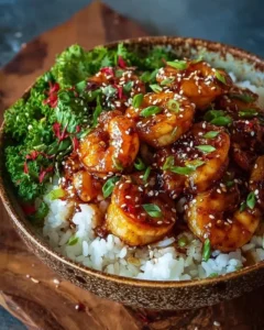 Delicious honey garlic shrimp bowl with fresh vegetables and rice