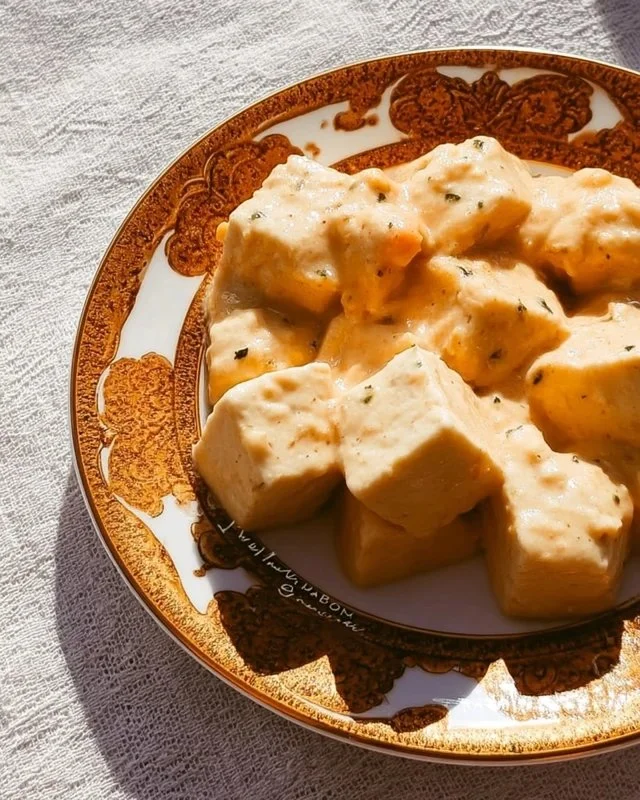 Delicious Marry Me Tofu dish served on a plate with fresh herbs