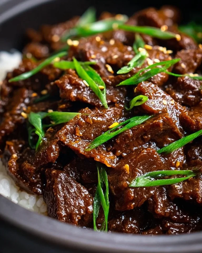 Slow Cooker Mongolian Beef served with rice and vegetables