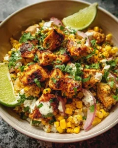 Delicious Street Corn Chicken Bowl topped with fresh ingredients