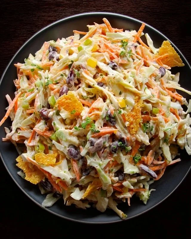 Bold and flavor-packed coleslaw served in a vibrant bowl with fresh ingredients