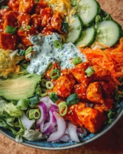 Buffalo Chicken Bowls with toppings and ingredients for a flavorful meal