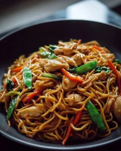 Homemade Chicken Lo Mein prepared with vegetables and noodles.