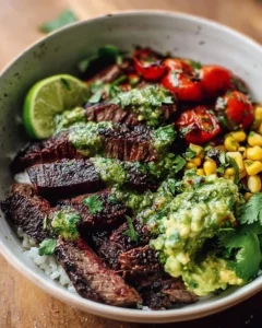 Delicious cilantro lime steak bowls served with fresh ingredients and toppings.