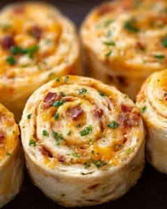 Delicious Crack Chicken Pinwheels served on a platter
