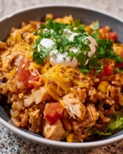 Instant Pot chicken burrito bowls served in a bowl with toppings