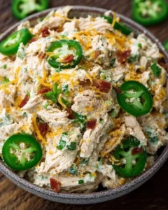 Delicious Jalapeno Popper Keto Chicken Salad garnished with jalapenos and cheese