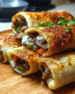 Keto Philly Cheesesteak Roll Ups served on a plate