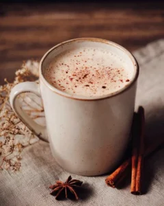 A delicious Vanilla Chai Tea Latte topped with frothy milk and spices.
