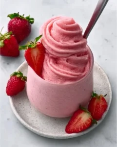 Delicious 4-ingredient strawberry frozen yogurt in a bowl