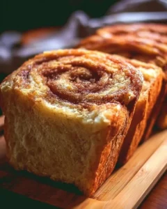 Deliciously baked Amish cinnamon bread with a swirl of cinnamon glaze