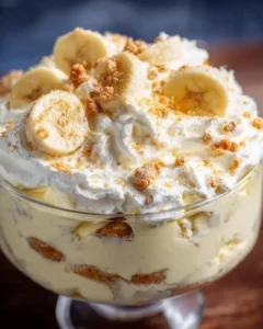 Delicious banana pudding fluff dessert salad with layers of banana and cream.