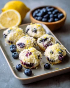 Blueberry and lemon zest cottage cheese bites on a plate.