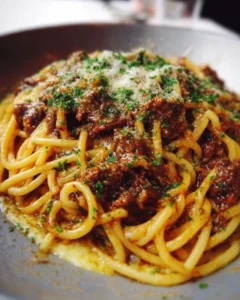 Delicious Cajun Beef Spaghetti in creamy three-cheese Parmesan sauce served on a plate