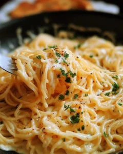 Delicious plate of Garlic Parmesan Spaghetti with cheese and garlic flavors.