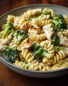 Creamy rotisserie chicken pasta with broccoli in a bowl