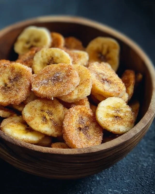 Crispy cinnamon sugar banana chips in a bowl, a delicious and healthy snack option.