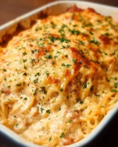 Delicious easy cheesy casserole served in a baking dish with melted cheese on top