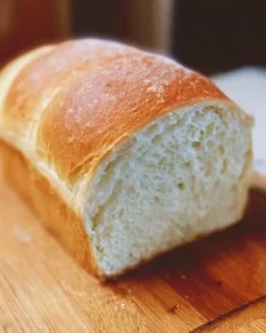 Freshly baked homemade bread on a wooden table
