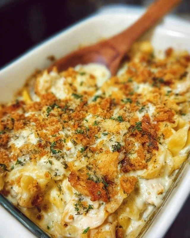Delicious million dollar chicken casserole served in a baking dish