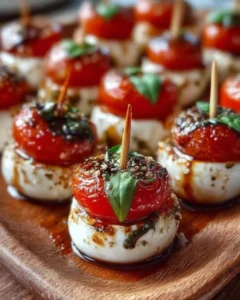 Delicious mini Caprese bites with fresh mozzarella, tomatoes, and basil.