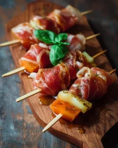 Delicious prosciutto skewers served with mellow ingredients on a platter.
