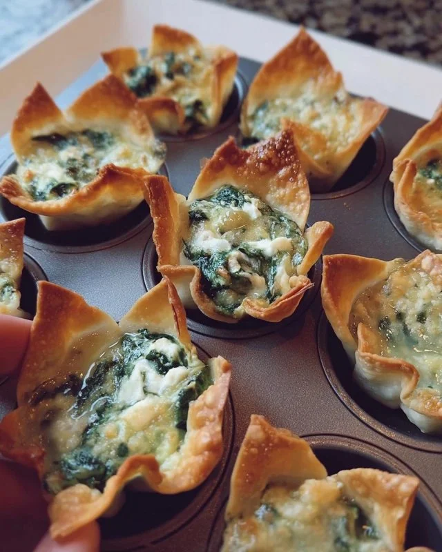 Delicious spinach and artichoke wonton cups served on a platter