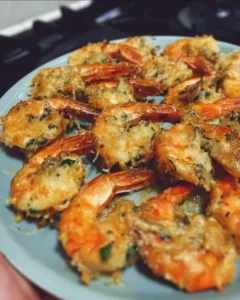 Plate of mouthwatering stuffed shrimp with herbs and spices